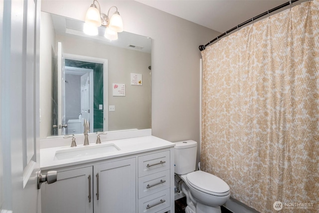 6628 Carolina St SE, Olympia, WA 98513 - full bathroom with toilet, vanity, and curtained shower