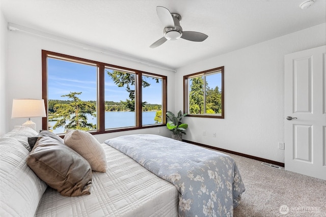 931 Oyster Bay Ct, Bremerton, WA 98312 - bedroom with carpet flooring, ceiling fan, and a water view