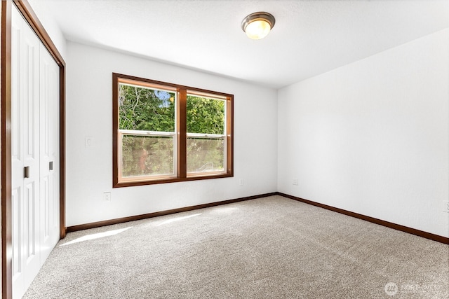 931 Oyster Bay Ct, Bremerton, WA 98312 - unfurnished bedroom featuring carpet floors and a closet