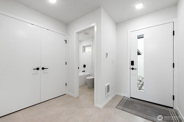 8324 16th Ave NW Unit A, Seattle, WA 98117 - foyer featuring baseboards and light tile patterned flooring