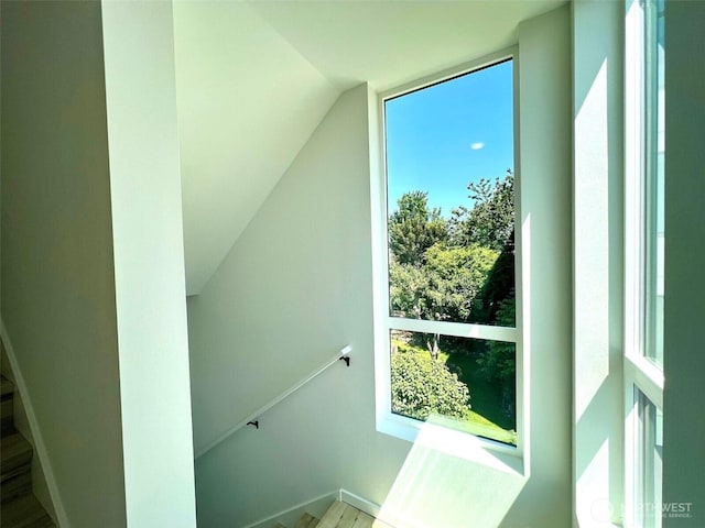 8324 16th Ave NW Unit A, Seattle, WA 98117 - stairs with lofted ceiling and baseboards