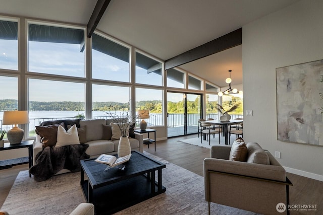 5110 NW Sammamish Rd, Issaquah, WA 98027 - living area with beamed ceiling, wood finished floors, baseboards, high vaulted ceiling, and a water view