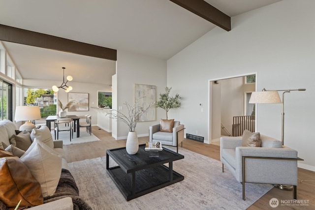 5110 NW Sammamish Rd, Issaquah, WA 98027 - living area featuring beamed ceiling, a chandelier, wood finished floors, baseboards, and high vaulted ceiling