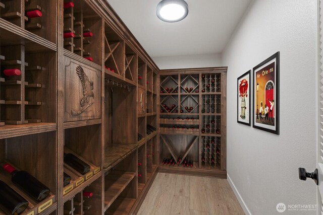 5110 NW Sammamish Rd, Issaquah, WA 98027 - wine area featuring wood finished floors and baseboards