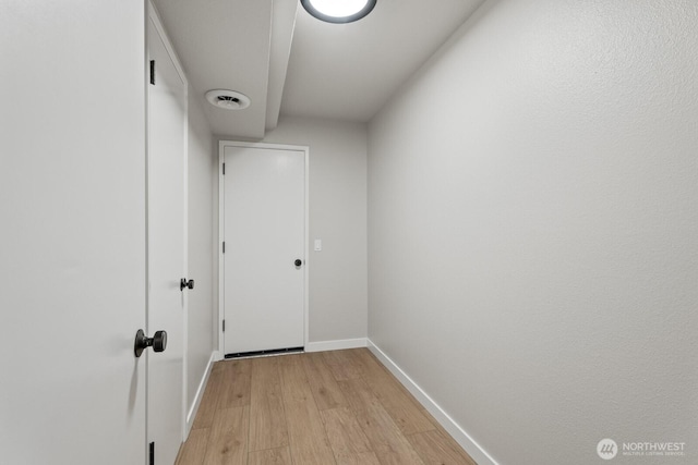5110 NW Sammamish Rd, Issaquah, WA 98027 - corridor with baseboards and light wood-style flooring