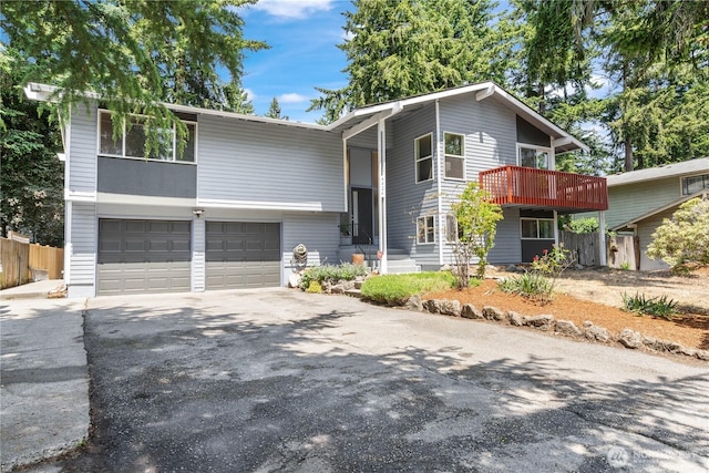 4426 NE 17th St, Renton, WA 98059 - view of front of house with an attached garage and asphalt driveway