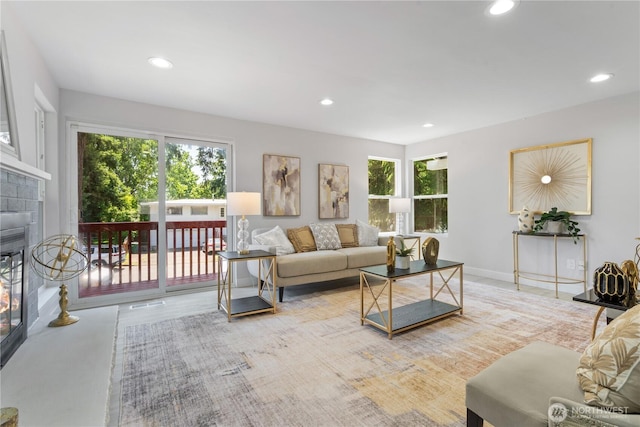 4426 NE 17th St, Renton, WA 98059 - living area with a glass covered fireplace, recessed lighting, and baseboards