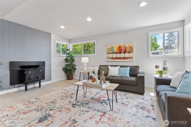 4426 NE 17th St, Renton, WA 98059 - living area with wood finished floors, recessed lighting, and baseboards
