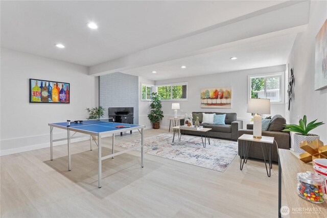 4426 NE 17th St, Renton, WA 98059 - playroom featuring light wood-type flooring, recessed lighting, a fireplace, and baseboards