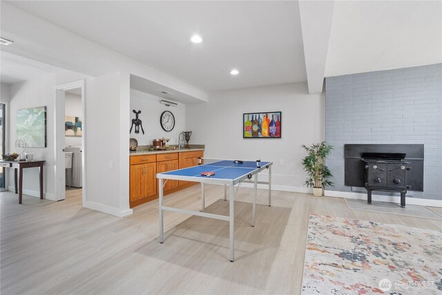 4426 NE 17th St, Renton, WA 98059 - rec room featuring light wood finished floors, baseboards, and recessed lighting