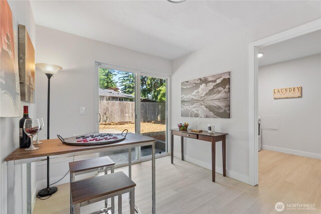 4426 NE 17th St, Renton, WA 98059 - dining space with light wood-type flooring and baseboards
