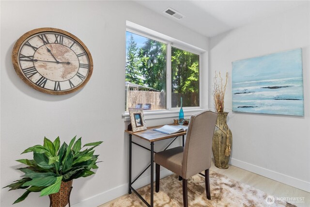 4426 NE 17th St, Renton, WA 98059 - home office with baseboards and light wood-style flooring