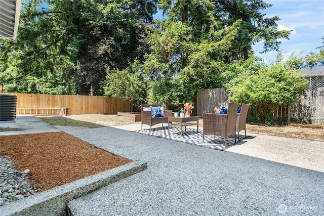 4426 NE 17th St, Renton, WA 98059 - fenced backyard with an outdoor hangout area and a patio area