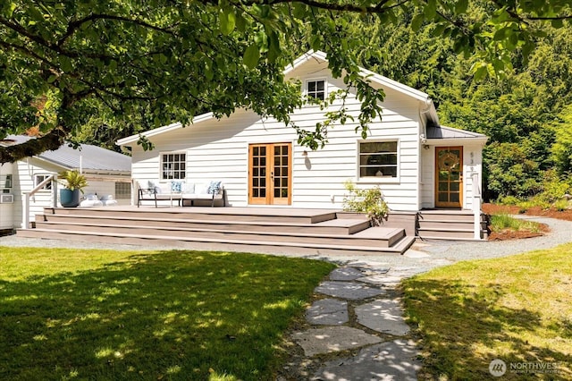 5396 Langley Rd, Langley, WA 98260 - back of house featuring a deck, a yard, and french doors