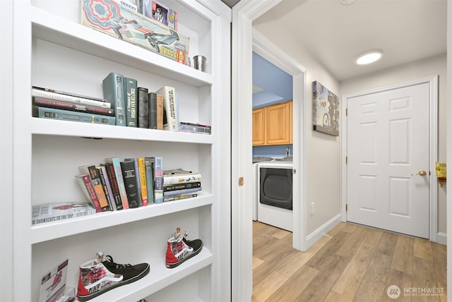649 Summit Pl, Sedro Woolley, WA 98284 - corridor with light wood finished floors, washer / dryer, and baseboards