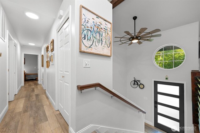 649 Summit Pl, Sedro Woolley, WA 98284 - corridor featuring light wood finished floors, baseboards, recessed lighting, and an upstairs landing