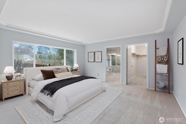 8221 53rd Ave W Unit G-27, Mukilteo, WA 98275 - bedroom with light carpet, a walk in closet, baseboards, and connected bathroom