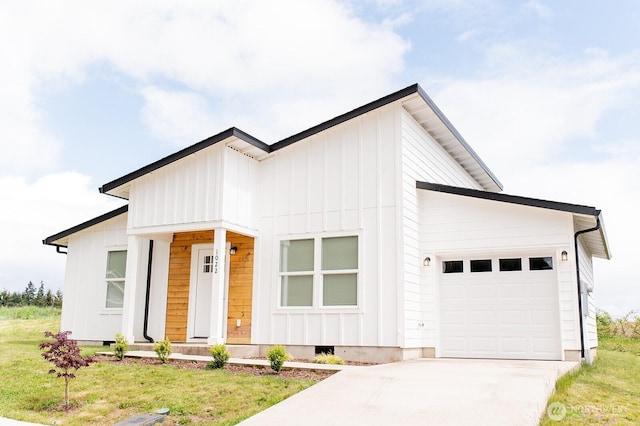 1022 Peach Rd, Winlock, WA 98596 - modern farmhouse style home with board and batten siding, a garage, concrete driveway, crawl space, and a front yard
