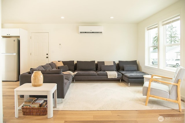 1022 Peach Rd, Winlock, WA 98596 - living room with a wall unit AC, light wood finished floors, and recessed lighting