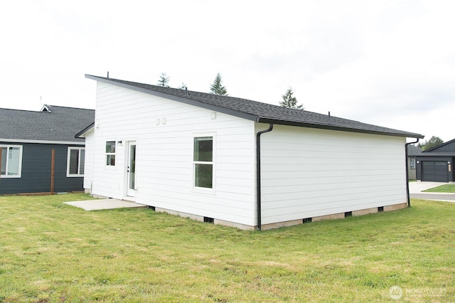 1022 Peach Rd, Winlock, WA 98596 - back of house with a lawn