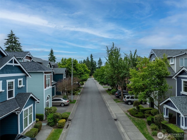 17826 20th Ave SE, Bothell, WA 98012 - view of asphalt street featuring curbs, a residential view, street lights, and sidewalks