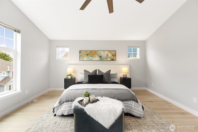 17826 20th Ave SE, Bothell, WA 98012 - bedroom featuring light wood-style floors, ceiling fan, and vaulted ceiling