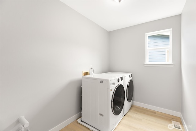 17826 20th Ave SE, Bothell, WA 98012 - laundry room with separate washer and dryer and light wood-style floors