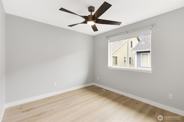 17826 20th Ave SE, Bothell, WA 98012 - empty room with light wood-style floors and a ceiling fan