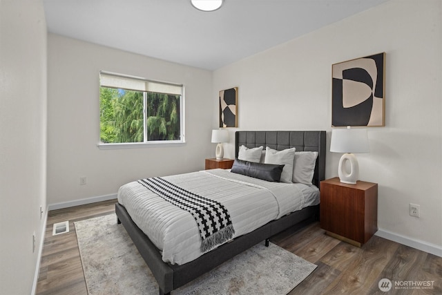 18805 20th Ave SE, Bothell, WA 98012 - bedroom featuring wood finished floors and baseboards