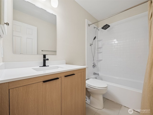 23501 112th Ave SE Unit M104, Kent, WA 98031 - bathroom featuring vanity, toilet, shower / bath combo with shower curtain, and tile patterned flooring
