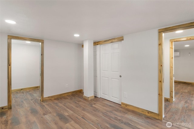 330 Highland Ave, Chelan, WA 98816 - unfurnished bedroom featuring wood finished floors, recessed lighting, baseboards, and a closet