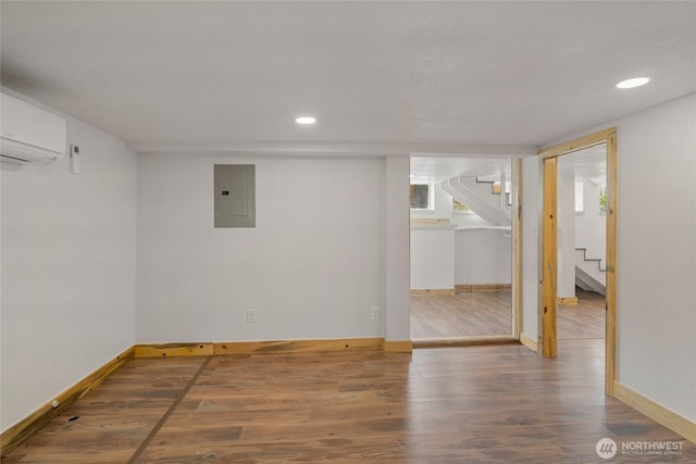 330 Highland Ave, Chelan, WA 98816 - below grade area with stairs, electric panel, wood finished floors, recessed lighting, and baseboards