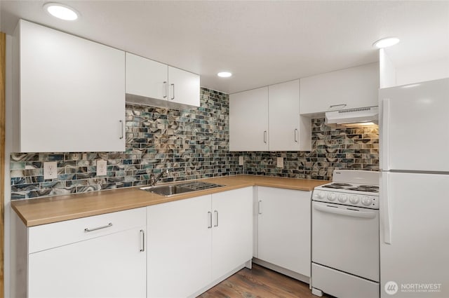 330 Highland Ave, Chelan, WA 98816 - kitchen with white appliances, ventilation hood, a sink, light countertops, and decorative backsplash