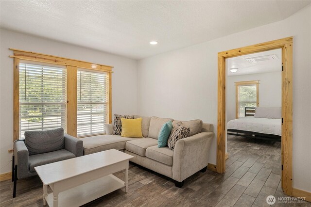 330 Highland Ave, Chelan, WA 98816 - living room with wood finished floors, baseboards, and recessed lighting
