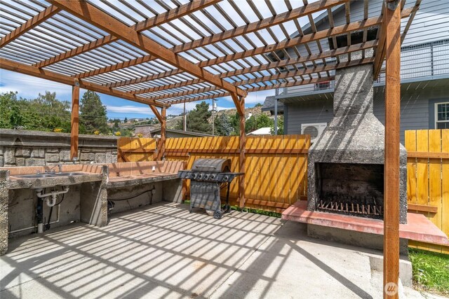 330 Highland Ave, Chelan, WA 98816 - view of patio with a fireplace with raised hearth