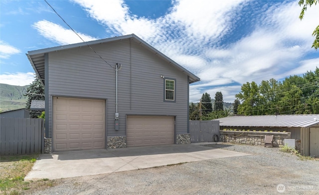 330 Highland Ave, Chelan, WA 98816 - view of property exterior with concrete driveway