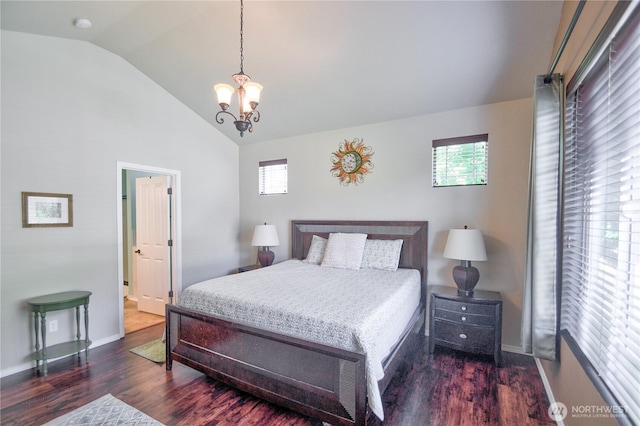 9127 Perwinkle Loop NE, Olympia, WA 98516 - bedroom featuring a chandelier, wood finished floors, multiple windows, and high vaulted ceiling