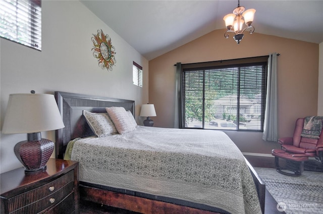 9127 Perwinkle Loop NE, Olympia, WA 98516 - bedroom featuring lofted ceiling, multiple windows, a chandelier, and baseboards