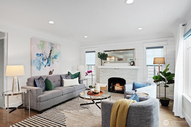 3236 15th Ave S, Seattle, WA 98144 - living room with wood finished floors, a fireplace, and recessed lighting