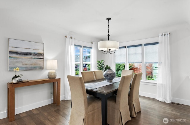 3236 15th Ave S, Seattle, WA 98144 - dining area with a chandelier and dark wood-style flooring