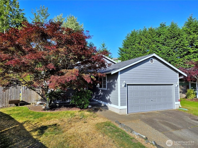 19523 71st Ave E, Spanaway, WA 98387 - view of front of home with asphalt driveway and roof with shingles