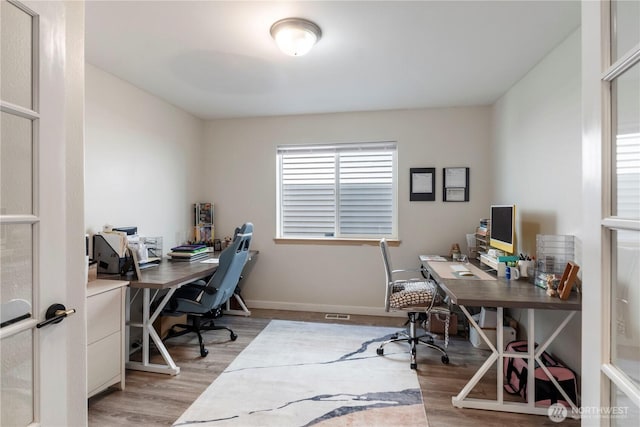 18113 17th Avenue Ct E, Spanaway, WA 98387 - home office featuring light wood finished floors and baseboards