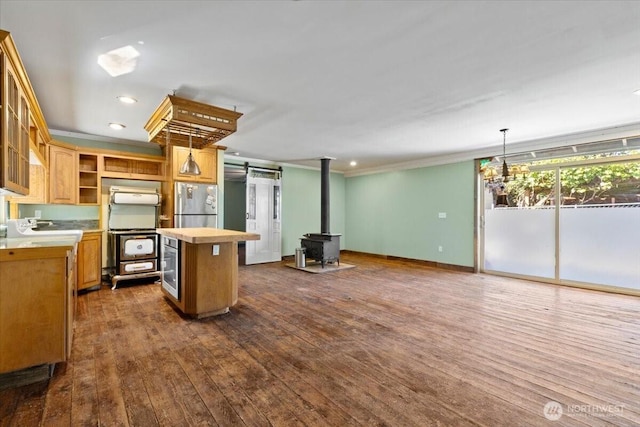 41506 292nd Way SE, Enumclaw, WA 98022 - kitchen with freestanding refrigerator, a center island, open shelves, dark wood-type flooring, and light countertops
