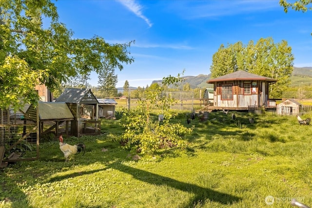 41506 292nd Way SE, Enumclaw, WA 98022 - view of yard featuring a mountain view, exterior structure, and an outdoor structure