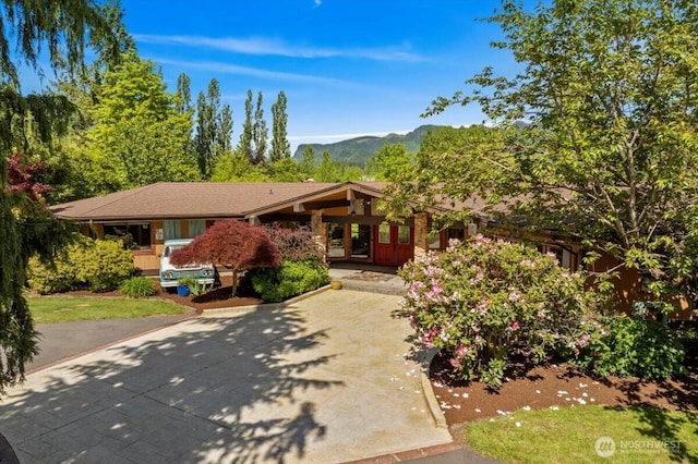 41506 292nd Way SE, Enumclaw, WA 98022 - view of front facade with a mountain view and concrete driveway