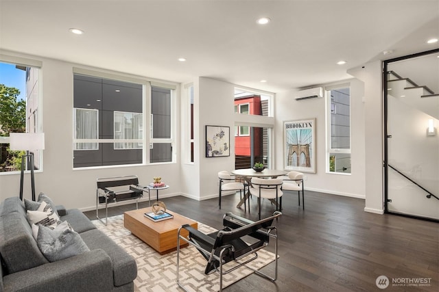818 25th Ave S Unit A, Seattle, WA 98144 - living room with a wall mounted AC, wood finished floors, recessed lighting, and stairs