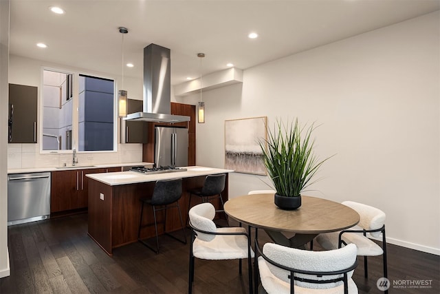 818 25th Ave S Unit A, Seattle, WA 98144 - kitchen with appliances with stainless steel finishes, island range hood, modern cabinets, a kitchen island, and light countertops
