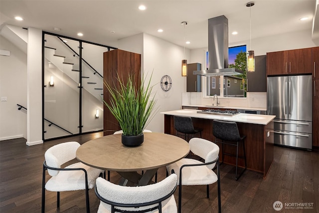 818 25th Ave S Unit A, Seattle, WA 98144 - dining space with dark wood-style flooring, recessed lighting, and stairs