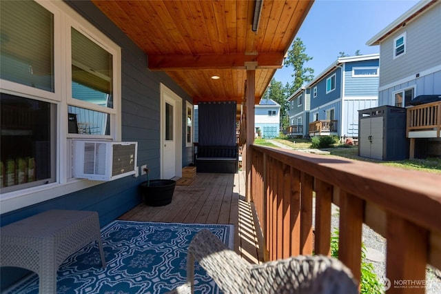 585 Finnegan Rdg, Friday Harbor, WA 98250 - deck with a residential view, cooling unit, and a storage unit
