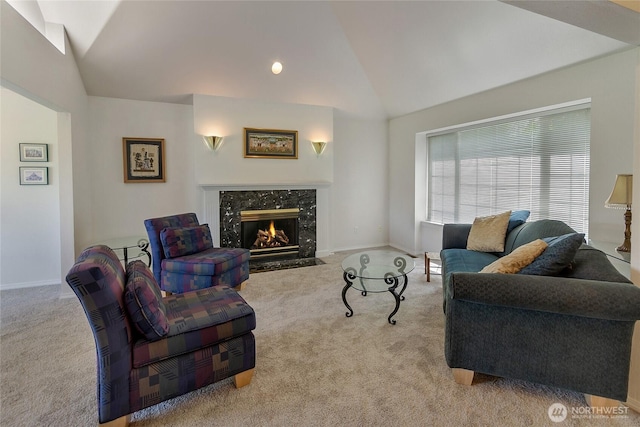 11207 16th St E, Edgewood, WA 98372 - living area with vaulted ceiling, carpet flooring, a high end fireplace, and baseboards